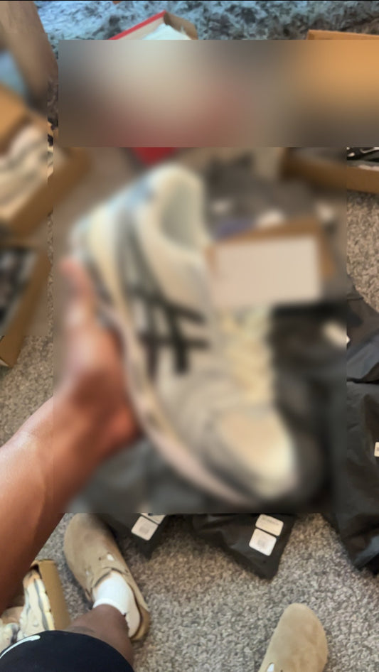 Cream running shoes
